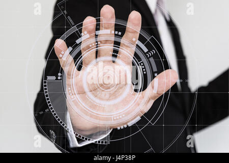 Hand touching futuristic interface screen Stock Photo