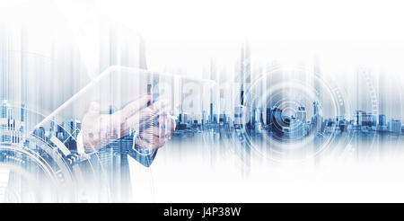 Double exposure businessman working on digital tablet, concepts of business technology network Stock Photo
