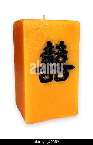 Orange color candle with Chinese pattern isolated on white (This is not a text, that's just a non figurative pattern) Stock Photo
