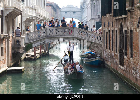 Italy, Venice, gondola along the Rio Della Fava with the Bridge of Sighs in the distance. Stock Photo