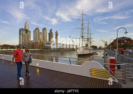Argentina, Buenos Aires, part of town of Puerto Madero, museum ship 'Sarmiento', pedestrian, bridge, no model release, Stock Photo