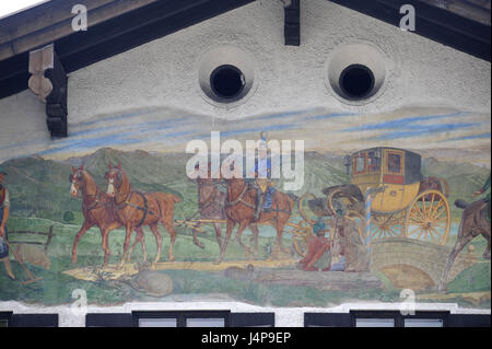 Lüftlmalerei stagecoach on a house facade in Rottach-Egern in the Tegernsee, Stock Photo