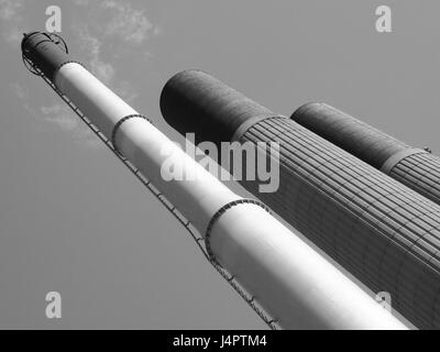 tall industrial chimneys in steel and concrete Stock Photo