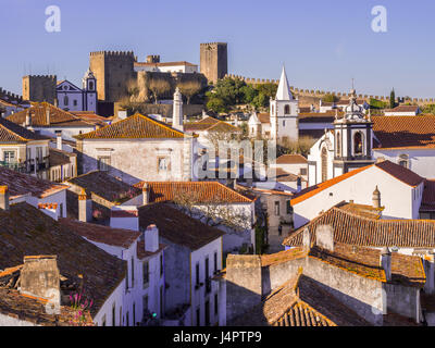 Cityscape of Obidos, Portugal, on a late spring afternoon. Stock Photo