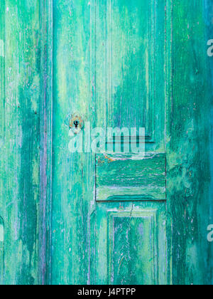 Old green wooden door in Obidos, Portugal Stock Photo