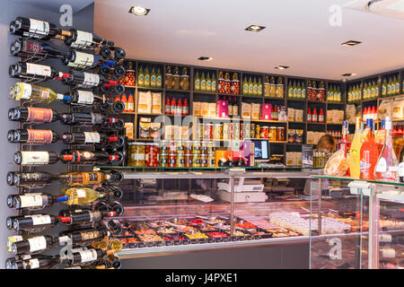 FRANCE, AIX-EN-PROVENCE- MAY 7, 2016: Shelves with wine bottles in food supermarket Stock Photo