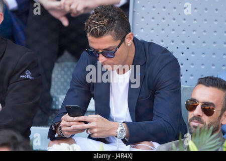 Madrid, Spain. 13th May, 2017.Soccerplayer Cristiano Ronaldo during a semifinal Madrid Open tennis tournament match at La Caja Magica stadium in Madrid, on Saturday 13, May 2017. Stock Photo