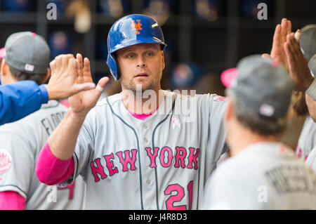 Milwaukee, WI, USA. 13th May, 2017. New York Mets first baseman Lucas Duda #21 is congratulated after scoring in the second inning of the Major League Baseball game between the Milwaukee Brewers and the New York Mets at Miller Park in Milwaukee, WI. John Fisher/CSM/Alamy Live News Stock Photo