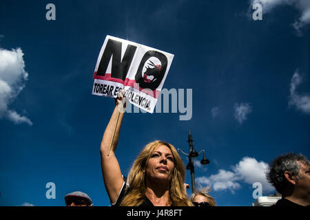 Madrid, Spain. 13th May, 2017. A woman demanding the abolition of bullfighting during a demonstration in Madrid, Spain. Credit: Marcos del Mazo/Alamy Live News Stock Photo