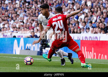 Madrid, Spain. 14th May, 2017. Marco Asensio Willmsen (20) Real Madrid's player. Gabriel Mercado (24) Sevilla FC's player.La Liga between Real Madrid vs Sevilla FC at the Santiago Bernabeu stadium in Madrid, Spain, May 14, 2017 . Credit: Gtres Información más Comuniación on line,S.L./Alamy Live News Stock Photo