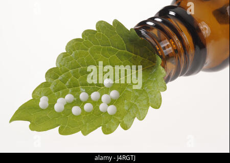 Alternative medicine, homoeopathy, Globuli, leaves, medicament bottle, studio, medium close-up, Stock Photo