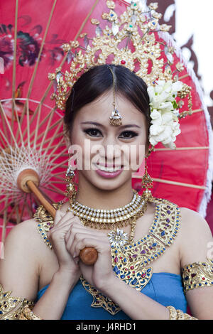 Thailand, Chiang May, Chiang May Flower Festival, woman, floral decoration, display screen, dress, traditionally, half portrait, no model release,