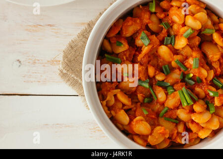 Baked lima beans in white pan selective focus Stock Photo