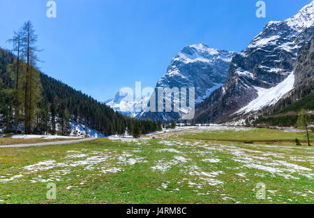 Spring mountain landscape with patches of melting snow. Austria, Tyrol, Karwendel Alpine Park Stock Photo