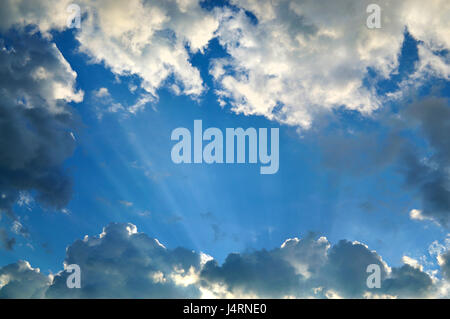 Sunbeam through the haze on a blue sky Stock Photo