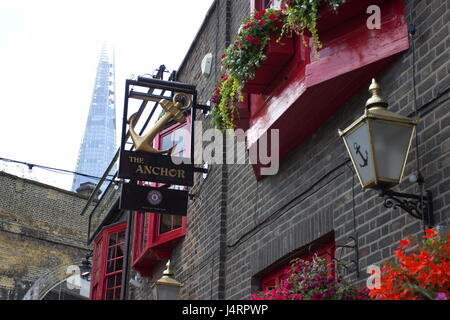 The Anchor Pub 1615 Thameside pub and towering Shard in the background  Southwark London England Stock Photo