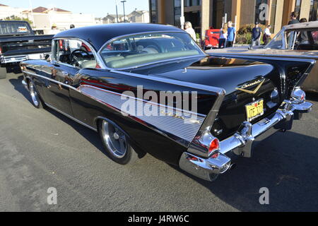 1957 chevy, chevrolet, black bel air at small town main street car show Stock Photo