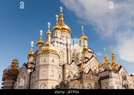 orthodox church with golden domes, Trinity cathedral and bell tower in Pochaev Lavra (Pochayiv Lavra), Ukraine Stock Photo