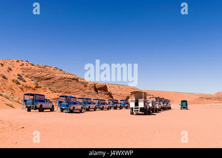 Antelope Canyon Tour Vehicles Parked In The Desert, Arizona Stock Photo