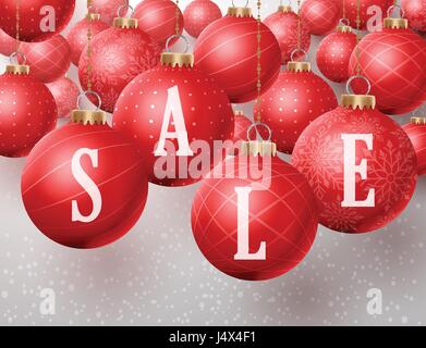 Christmas sale text vector in Christmas red balls hanging in a winter snow background for discounts and promotions. Vector illustration. Stock Vector