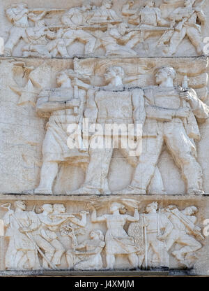 Relief above the Council of Ministers glorifies socialist victory in all fields, Tirana, Albania on September 27, 2016 Stock Photo