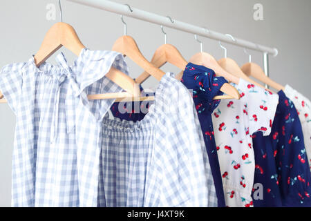 Variety of casual dresses on hangers. Close up Stock Photo