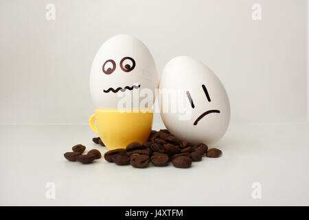 An egg with a face. Funny and sweet. TWO EGGS. MORNING AND CUP OF COFFEE. NECESSARY. BECAUSE BECOME ONCE. I WANT TO SLEEP ON. Sleepy. Photo for your d Stock Photo