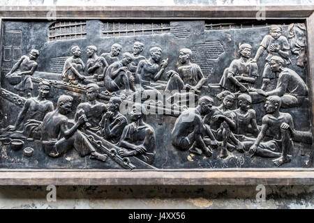 Plaque showing conditions and abuses during French Colonial times at Hoa Lo prison Hanoi Vietnam. During Vietnam war held American POWs Stock Photo