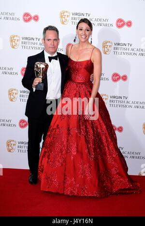 Suranne Jones presents Tom Hollander with the award for Best in the press room at the Virgin TV British Academy Television Awards 2017 held at Festival Hall at Southbank Centre, London. PRESS ASSOCIATION Photo. Picture date: Sunday May 14, 2017. See PA story SHOWBIZ Bafta. Photo credit should read: Ian West/PA Wire Stock Photo