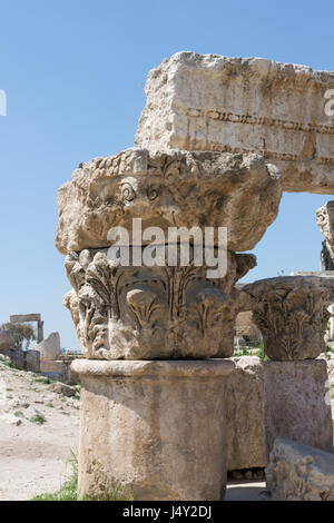 Close up of section of a column with ornately carved capital and lintel or beam. Photographed in Jabal al Qul'a, Amman Citadel, Jordan. Stock Photo