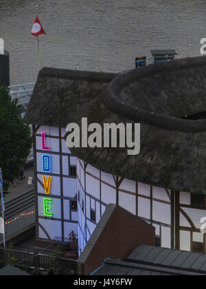 The Globe Theatre in London with the word LOVE in coloured neon lights Stock Photo
