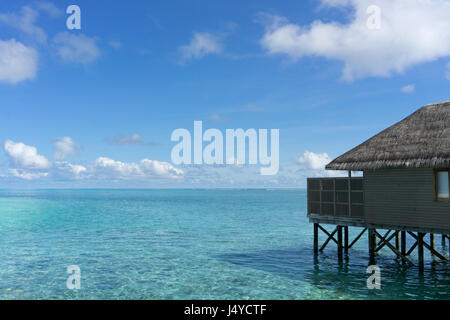 Meeru resort and spa, Maldives - May 8, 2017: Water villas over calm sea in tropical Maldives island Stock Photo