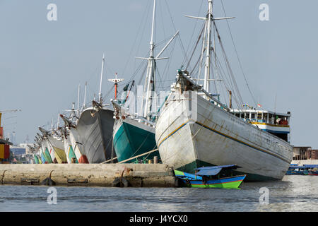 Looking down the line of pinisi, Sunda Kelapa harbour, Jakarta, Indonesia Stock Photo