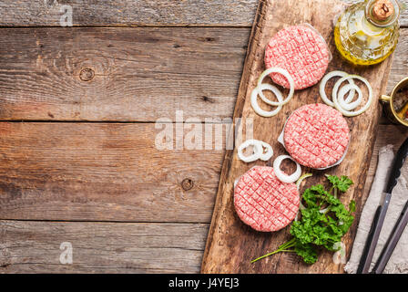 Raw burger and spices Stock Photo