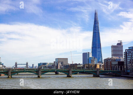 LONDON - APR 20 : The Shard building and riverside pictured on April 20th, 2017, in London. The Shard opened to the public on February 2013. Standing 309m, the Shard is the tallest building in Europe. Stock Photo