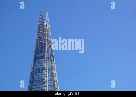 LONDON - APR 20 : The Shard building at sunset pictured on April 20th, 2017, in London. The Shard opened to the public on February 2013. Standing 309m, the Shard is the tallest building in Europe. Stock Photo