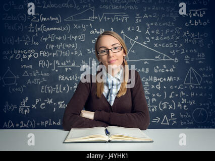 Cheerful student siting front open book and learning Stock Photo