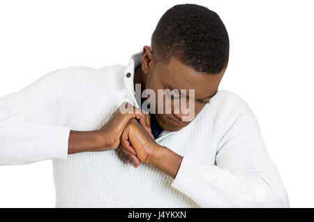 Closeup portrait sad depressed, alone, disappointed gloomy young man having bad thoughts isolated white background. Human emotion facial expression pe Stock Photo