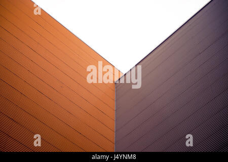 Industrial, urban background. Orange and brown metal walls corner Stock Photo