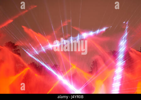 Red laser disco show. Abstract red lights from projector Stock Photo