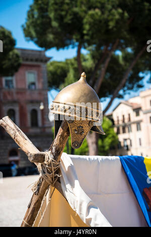 Re-enactors and artifacts at the celebration of the birthday of the city of Rome on the Circus Maximus Grounds in Rome Italy Stock Photo