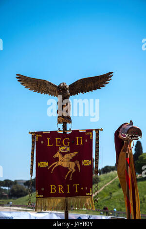 Re-enactors and artifacts at the celebration of the birthday of the city of Rome on the Circus Maximus Grounds in Rome Italy Stock Photo