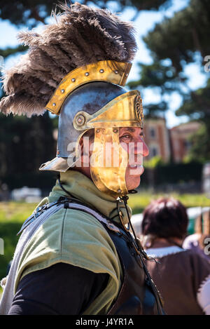 Re-enactors and artifacts at the celebration of the birthday of the city of Rome on the Circus Maximus Grounds in Rome Italy Stock Photo