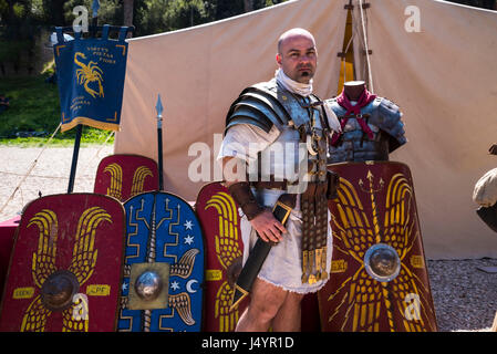 Re-enactors and artifacts at the celebration of the birthday of the city of Rome on the Circus Maximus Grounds in Rome Italy Stock Photo