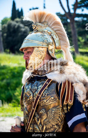 Re-enactors and artifacts at the celebration of the birthday of the city of Rome on the Circus Maximus Grounds in Rome Italy Stock Photo