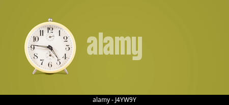 retro alarm clock header on colored background Stock Photo