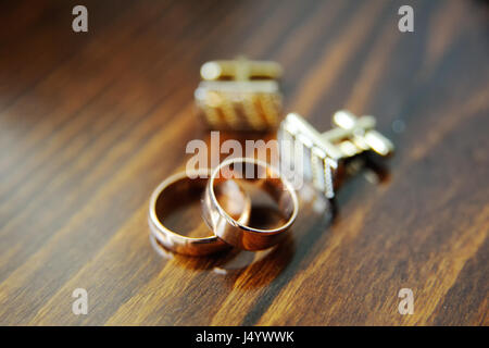 wedding rings and cufflinks Stock Photo