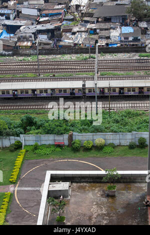 Railway track and slums at vikhroli, mumbai, maharashtra, india, asia Stock Photo