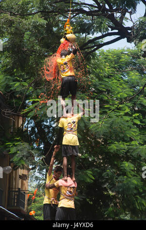 Human pyramid broken dahi handi, mumbai, maharashtra, india, asia Stock Photo