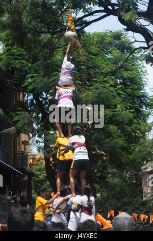 Human pyramid broken dahi handi, mumbai, maharashtra, india, asia Stock Photo